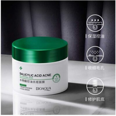 ماسک ضد جوش سالیسیلیک اسید بیوآکوا در ظرف سفید و درب سبز،با آیکون های کنترل چربی کوچک‌کردن منافذ و ترمیم پوست، پس زمینه تیره و لوکس